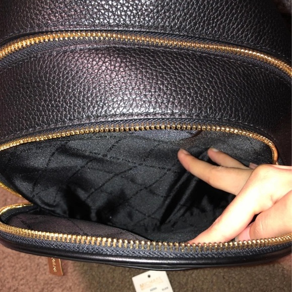 adina medium pebbled leather backpack Michael Kors Kenly Vanilla MK Signature Fashion wear shape thats designed for any lifestyle Adina medium backpack